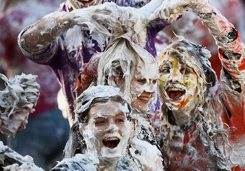 Hundreds of students got themselves lathered up as they took part in a traditional foam fight at St Andrews University.