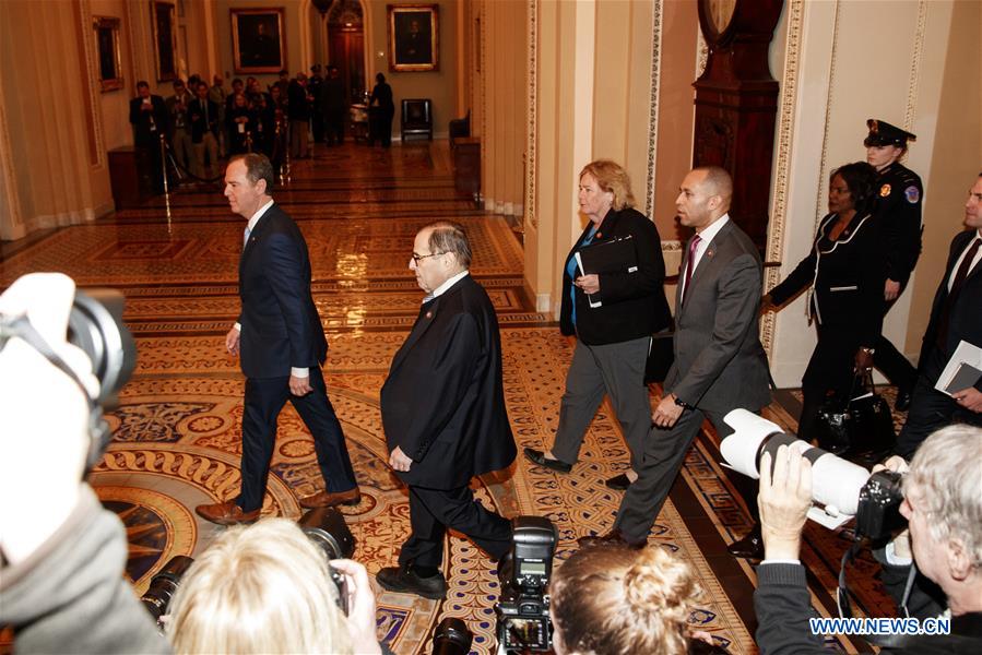 U.S. House Intelligence Committee Chairman Adam Schiff (1st L), U.S. House Judiciary Committee Chairman Jerry Nadler (2nd L) and other impeachment managers arrive at the Senate Chamber before the start of the Senate impeachment trial on Capitol Hill in Washington D.C., the United States, on Jan. 21, 2020. The impeachment trial against U.S. President Donald Trump kicked off Tuesday in the Senate as the chamber debated, and would later vote on, a resolution stipulating rules guiding the process. (Photo by Ting Shen/Xinhua)