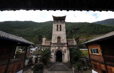 Photo&nbsp;taken&nbsp;on&nbsp;Oct.&nbsp;23,&nbsp;2009&nbsp;shows&nbsp;the&nbsp;outside&nbsp;view&nbsp;of&nbsp;the&nbsp;Cizhong&nbsp;Catholic&nbsp;Church&nbsp;in&nbsp;Yanmen&nbsp;Township&nbsp;of&nbsp;Deqin&nbsp;County&nbsp;in&nbsp;southwest&nbsp;China's&nbsp;Yunnan&nbsp;Province.&nbsp;First&nbsp;built&nbsp;in&nbsp;1867&nbsp;and&nbsp;rebuilt&nbsp;in&nbsp;1909,&nbsp;the&nbsp;Cizhong&nbsp;Catholic&nbsp;Church&nbsp;is&nbsp;a&nbsp;model&nbsp;which&nbsp;combines&nbsp;the&nbsp;architecture&nbsp;features&nbsp;of&nbsp;both&nbsp;western&nbsp;countries&nbsp;and&nbsp;China's&nbsp;Tibet,&nbsp;Han&nbsp;and&nbsp;Bai&nbsp;ethnic&nbsp;groups.&nbsp;The&nbsp;church&nbsp;and&nbsp;its&nbsp;wing-room,&nbsp;gate,&nbsp;cellar&nbsp;and&nbsp;grape&nbsp;yard&nbsp;were&nbsp;well&nbsp;preserved&nbsp;by&nbsp;local&nbsp;government.&nbsp;It&nbsp;was&nbsp;listed&nbsp;as&nbsp;the&nbsp;key&nbsp;national&nbsp;cultural&nbsp;protection&nbsp;relics&nbsp;by&nbsp;the&nbsp;State&nbsp;Council&nbsp;in&nbsp;2006.&nbsp;(Xinhua/Lin&nbsp;Yiguang)