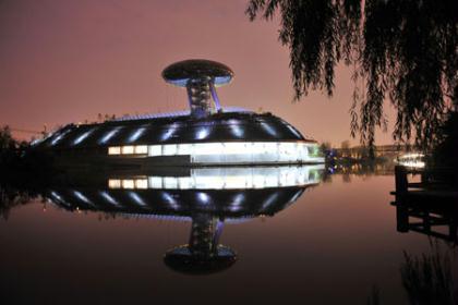 The&nbsp;night&nbsp;view&nbsp;of&nbsp;the&nbsp;China's&nbsp;Wetland&nbsp;Museum&nbsp;is&nbsp;shown&nbsp;in&nbsp;this&nbsp;picture&nbsp;taken&nbsp;in&nbsp;Hangzhou,&nbsp;east&nbsp;China's&nbsp;Zhejiang&nbsp;Province,&nbsp;Oct.&nbsp;28,&nbsp;2009.&nbsp;The&nbsp;museum,&nbsp;which&nbsp;opened&nbsp;to&nbsp;the&nbsp;public&nbsp;on&nbsp;Monday,&nbsp;is&nbsp;located&nbsp;in&nbsp;Xixi&nbsp;Wetland&nbsp;Park&nbsp;in&nbsp;Hangzhou.&nbsp;(Xinhua/Li&nbsp;Zhong)
