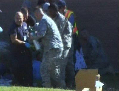 In&nbsp;this&nbsp;image&nbsp;made&nbsp;from&nbsp;Associated&nbsp;Press&nbsp;Television&nbsp;video,&nbsp;emergency&nbsp;personnel&nbsp;take&nbsp;a&nbsp;wounded&nbsp;person&nbsp;on&nbsp;a&nbsp;stretcher&nbsp;to&nbsp;an&nbsp;awaiting&nbsp;ambulance&nbsp;at&nbsp;the&nbsp;scene&nbsp;at&nbsp;the&nbsp;U.S.&nbsp;Army&nbsp;base&nbsp;in&nbsp;Fort&nbsp;Hood&nbsp;Texas&nbsp;where&nbsp;a&nbsp;soldier&nbsp;opened&nbsp;fire,&nbsp;unleashing&nbsp;a&nbsp;stream&nbsp;of&nbsp;gunfire&nbsp;that&nbsp;left&nbsp;at&nbsp;least&nbsp;12&nbsp;people&nbsp;dead&nbsp;and&nbsp;at&nbsp;least&nbsp;31&nbsp;wounded.(AP&nbsp;Photo/APTN)