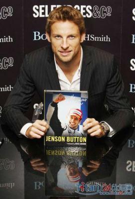 World&nbsp;Champion&nbsp;Formula&nbsp;One&nbsp;driver,&nbsp;Jenson&nbsp;Button&nbsp;of&nbsp;Britain,&nbsp;poses&nbsp;with&nbsp;his&nbsp;book&nbsp;"My&nbsp;Championship&nbsp;Year"&nbsp;at&nbsp;a&nbsp;book&nbsp;signing&nbsp;in&nbsp;London,&nbsp;November&nbsp;19,&nbsp;2009.