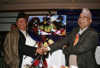 Nepalese&nbsp;Prime&nbsp;Minister&nbsp;Madhav&nbsp;Kumar&nbsp;Nepal&nbsp;(R)&nbsp;felicitates&nbsp;Min&nbsp;Bahadur&nbsp;Sherchan,&nbsp;in&nbsp;Kathmandu,&nbsp;capital&nbsp;of&nbsp;Nepal,&nbsp;Nov.&nbsp;23,&nbsp;2009.&nbsp;Min&nbsp;Bahadur&nbsp;Sherchan&nbsp;has&nbsp;officially&nbsp;replaced&nbsp;Japanese&nbsp;climber&nbsp;Yuichiro&nbsp;Miura&nbsp;in&nbsp;the&nbsp;Guinness&nbsp;Book&nbsp;of&nbsp;World&nbsp;Records&nbsp;as&nbsp;the&nbsp;oldest&nbsp;man&nbsp;to&nbsp;climb&nbsp;Mt&nbsp;Qomolangma&nbsp;(also&nbsp;Mt&nbsp;Everest),&nbsp;a&nbsp;press&nbsp;meet&nbsp;said&nbsp;on&nbsp;Monday.&nbsp;The&nbsp;certificate&nbsp;handed&nbsp;to&nbsp;Sherchan&nbsp;by&nbsp;the&nbsp;Guinness&nbsp;World&nbsp;Records&nbsp;says,&nbsp;"The&nbsp;oldest&nbsp;man&nbsp;to&nbsp;climb&nbsp;Mt&nbsp;Everest&nbsp;is&nbsp;Min&nbsp;Bahadur&nbsp;Sherchan&nbsp;(Nepal&nbsp;b.20&nbsp;June&nbsp;1931)&nbsp;who&nbsp;reached&nbsp;the&nbsp;summit&nbsp;on&nbsp;25&nbsp;May&nbsp;2008&nbsp;at&nbsp;the&nbsp;age&nbsp;of&nbsp;76&nbsp;years&nbsp;340&nbsp;days."&nbsp;(Xinhua/Bimal&nbsp;Gautam)