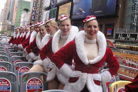 Radio&nbsp;City&nbsp;Rockettes&nbsp;pose&nbsp;on&nbsp;a&nbsp;double-decker&nbsp;Gray&nbsp;Line&nbsp;bus&nbsp;while&nbsp;cruising&nbsp;at&nbsp;the&nbsp;Times&nbsp;Square&nbsp;in&nbsp;New&nbsp;York&nbsp;Nov.&nbsp;24,&nbsp;2009.&nbsp;Eleven&nbsp;Radio&nbsp;City&nbsp;Rockettes&nbsp;and&nbsp;the&nbsp;Santa&nbsp;Claus&nbsp;cruised&nbsp;down&nbsp;the&nbsp;42nd&nbsp;Street&nbsp;aboard&nbsp;the&nbsp;bus&nbsp;and&nbsp;pulled&nbsp;up&nbsp;to&nbsp;the&nbsp;Madame&nbsp;Tussauds&nbsp;to&nbsp;welcome&nbsp;the&nbsp;Radio&nbsp;City&nbsp;Rockette&nbsp;wax&nbsp;figure&nbsp;back&nbsp;to&nbsp;Tussauds&nbsp;and&nbsp;the&nbsp;kick-off&nbsp;of&nbsp;the&nbsp;holiday&nbsp;season.&nbsp;(Xinhua/Wang&nbsp;Jiangang)