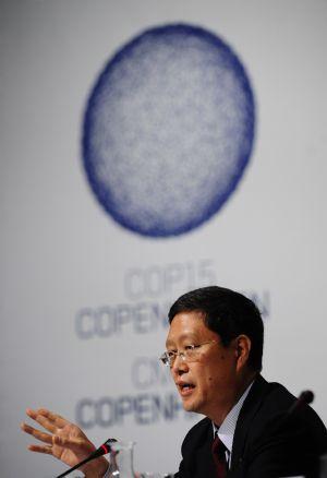 China's Vice Foreign Minister He Yafei addresses a press conference during the high-level segment of the United Nations Framework Climate Change Conference in Copenhagen, capital of Denmark, Dec. 17, 2009. (Xinhua/Zeng Yi)