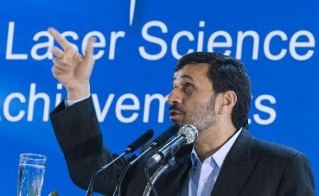 Iran's President Mahmoud Ahmadinejad speaks while visiting an exhibition of Iran laser science and technology in Tehran Feb. 7, 2010. (Xinhua/Reuters Photo)