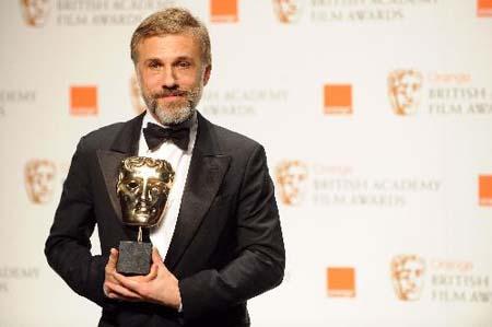 Austrian actor Christoph Waltz poses with his award for Best Supporting Actor in "Inglourious Basterds" at the British Academy of Film and Television Arts (BAFTA) award ceremony at the Royal Opera House in London, February 21, 2010. (Xinhua/AFP Photo)