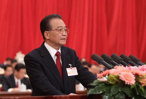 Chinese Premier Wen Jiabao delivers a government work report during the opening meeting of the Third Session of the 11th National People's Congress (NPC) at the Great Hall of the People in Beijing, capital of China, March 5, 2010. (Xinhua/Liu Weibing)