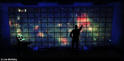 Hyperwall-2 is spread across 128 monitors and is used for a multitude of purposes such as displaying images from Nasa's Spitzer Space Telescope (as shown above)