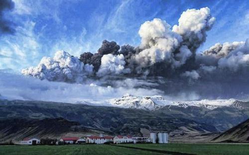 Smoke and steam hangs over the volcano under the Eyjafjallajokull glacier in Iceland, Wednesday April 14, 2010, which has erupted for the second time in less than a month, melting ice, shooting smoke and steam into the air and forcing hundreds of people to flee rising floodwaters. Volcanic ash drifting across the Atlantic forced the cancellation of flights in Britain and disrupted air traffic across northern Europe, stranding thousands of passengers. Flights in and out of London Heathrow, Europe's busiest airport, were halted, and the shutdowns and cancellations spread to France, Belgium, the Netherlands, Denmark, Ireland, Sweden, Finland and Switzerland. The volcano's smoke and ash poses a threat to aircraft because it can affect visibility, and microscopic debris can get sucked into airplane engines and can cause them to shut down. (Xinhua/Reuters Photo)