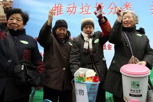 People are taking part in a garbage sorting contest