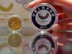 Commemorative coins of Summer Universiade go on sales<br><br>