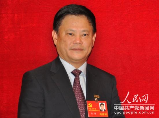 十八大代表、海南省委常委、宣传部长许俊。人民网记者文 松辉摄影