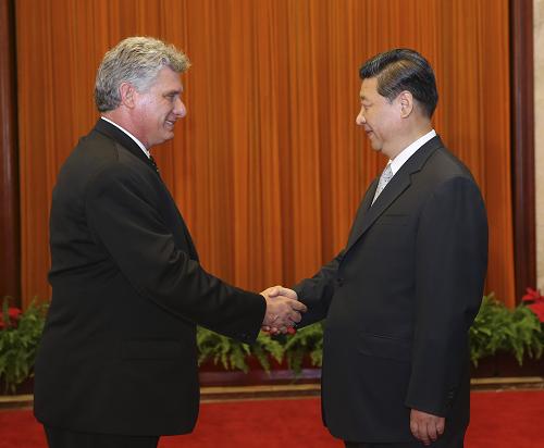 6月18日，国家主席习近平在北京人民大会堂会见古巴国务委员会第一副主席兼部长会议第一副主席迪亚斯·卡内尔。新华社记者 丁林 摄