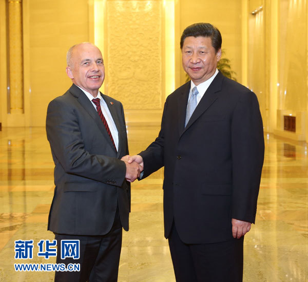 7月18日，国家主席习近平在北京人民大会堂会见瑞士联邦主席毛雷尔。