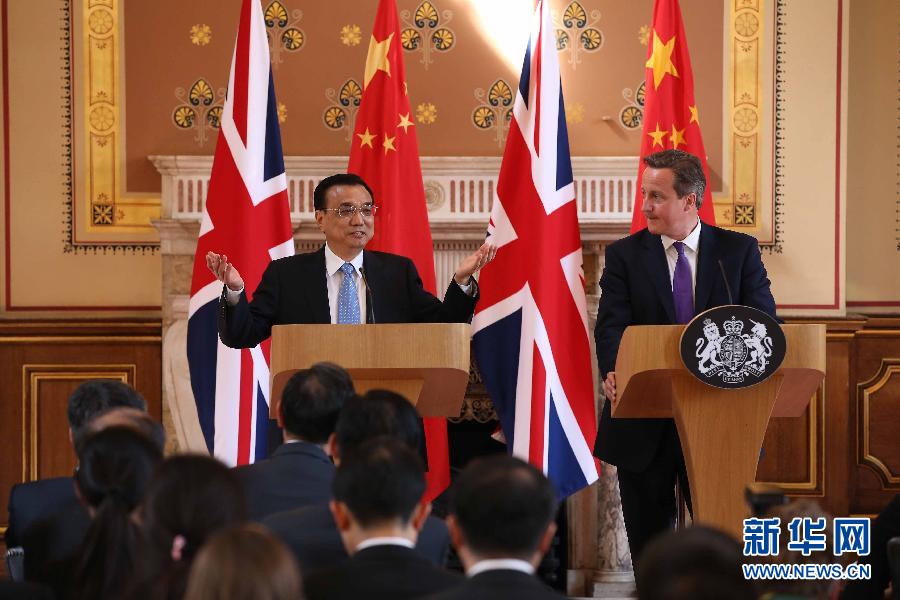 　　6月17日，国务院总理李克强同英国首相卡梅伦在伦敦举行中英总理年度会晤后共同会见记者。新华社记者 庞兴雷 摄