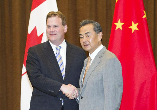 В Пекине состоялась встреча глав МИД Китая и Канады
