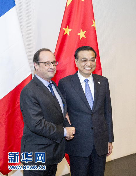 10月16日，中国国务院总理李克强在米兰会见法国总统奥朗德。新华社记者 王晔 摄