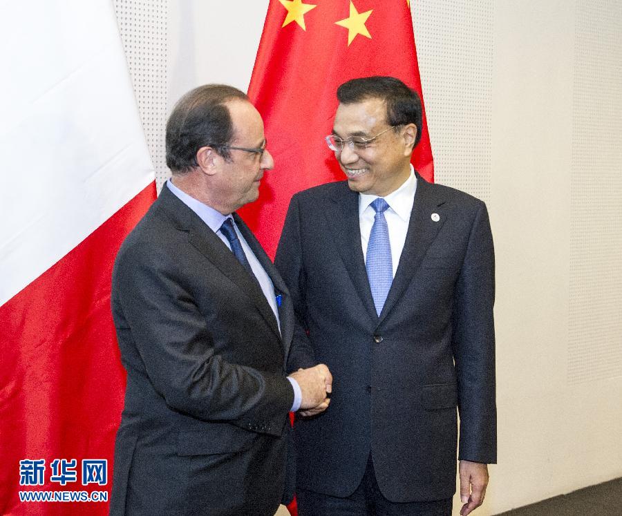 10月16日，中国国务院总理李克强在米兰会见法国总统奥朗德。新华社记者 王晔 摄