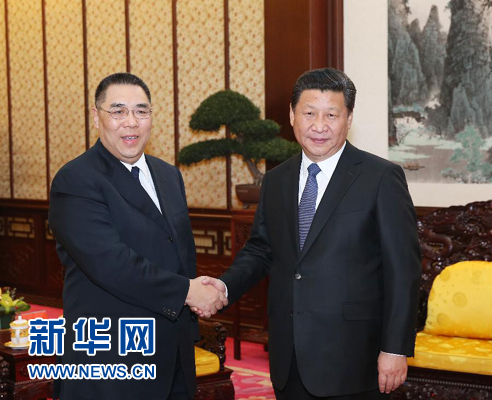 12月26日，国家主席习近平在中南海会见来北京述职的澳门特别行政区行政长官崔世安。新华社记者 庞兴雷 摄 