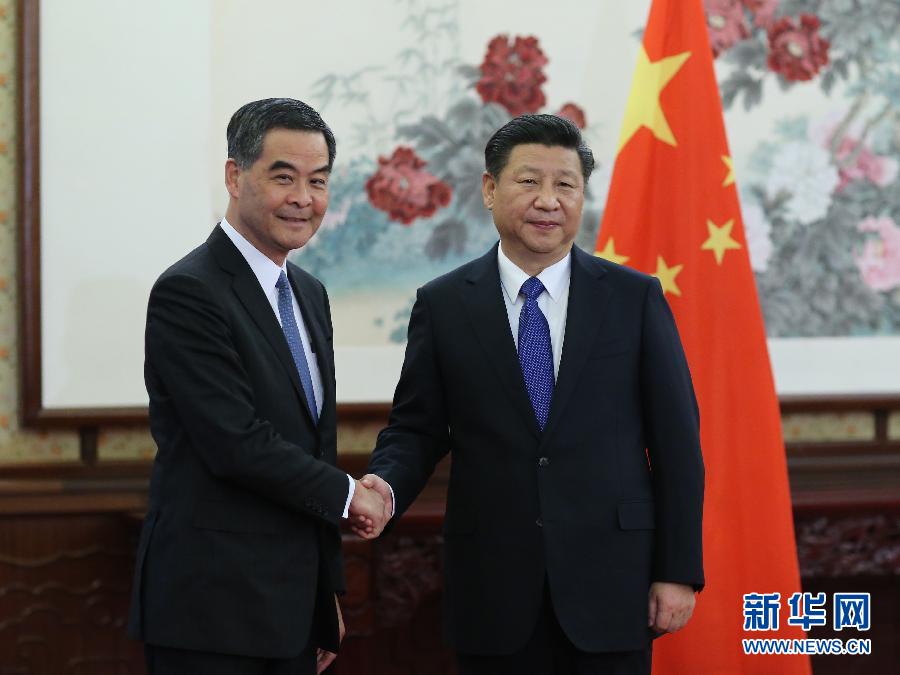  12月23日，国家主席习近平在中南海会见了来京述职的香港特别行政区行政长官梁振英。 新华社记者 兰红光 摄 