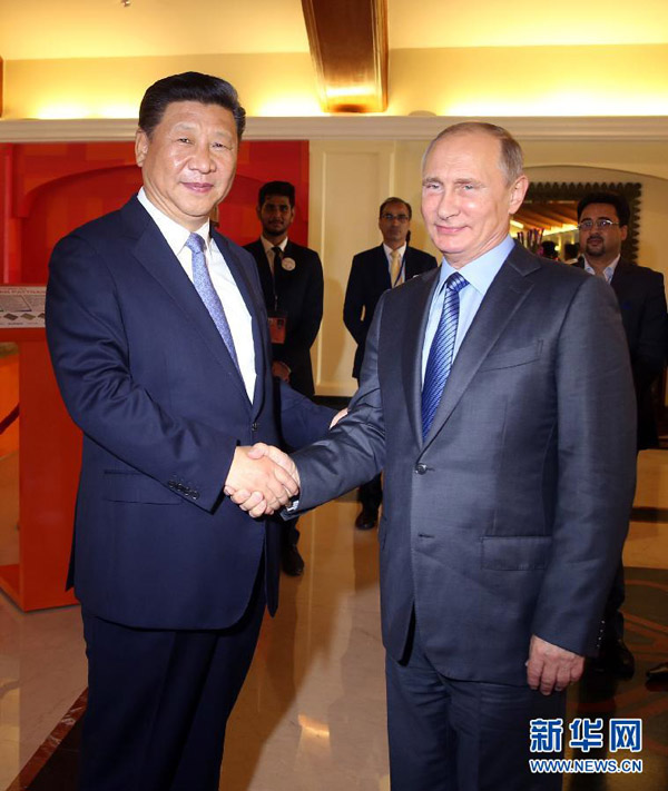 10月15日，国家主席习近平在印度果阿会见俄罗斯总统普京。