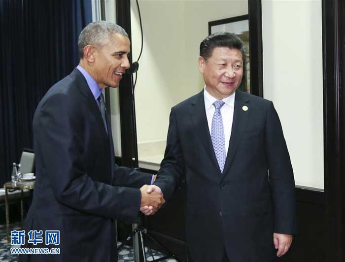  11月19日，国家主席习近平在利马会见美国总统奥巴马。