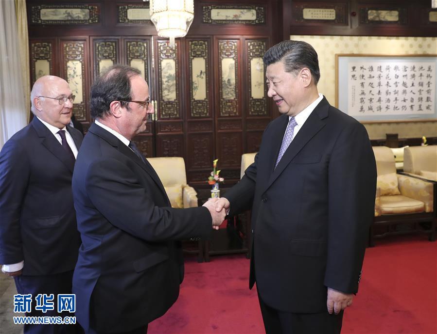 5月25日，国家主席习近平在北京钓鱼台国宾馆会见法国前总统奥朗德。
