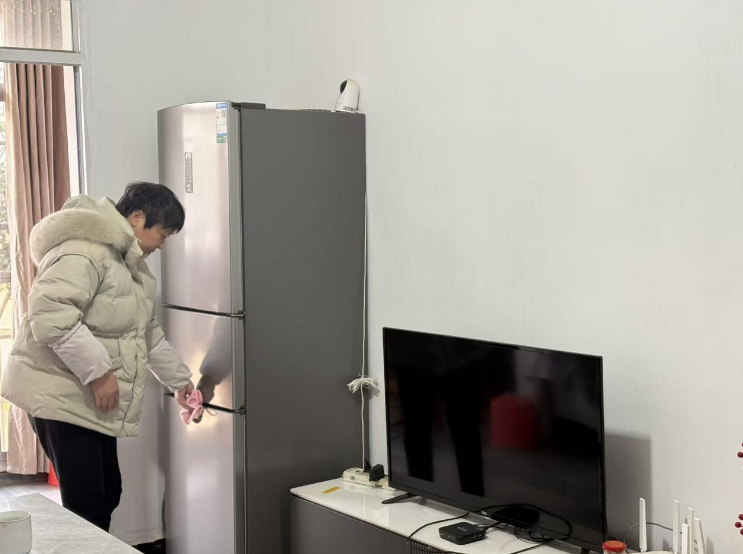 奉晓丽说自己过上了别人羡慕的生活(谭卫国/摄)