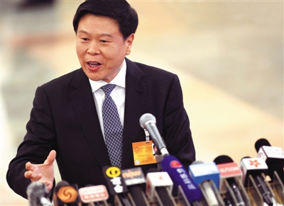 媒体追问房产税 国税总局局长王军称加快立法