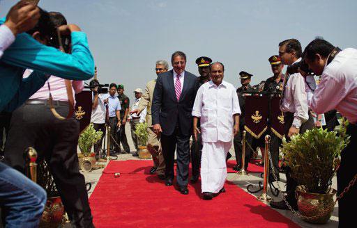 U.S. Defense Secretary Leon Panetta (centre, L) and India's Defence Minister A.K. Antony (centre, R) walk during a welcoming ceremony at the Defence Ministry in New Delhi June 6, 2012. Panetta encouraged Indian leaders on Tuesday to take a more active role in Afghanistan as international forces leave, saying Washington viewed Pakistan's long-time rival as a source of regional security.