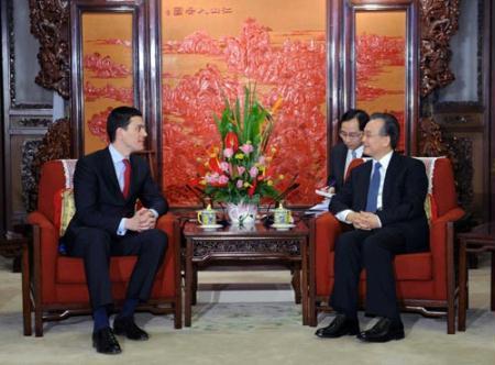 Chinese Premier Wen Jiabao (R) meets with British Foreign Secretary David Miliband in Beijing, capital of China, March 16, 2010. (Xinhua/Li Tao)