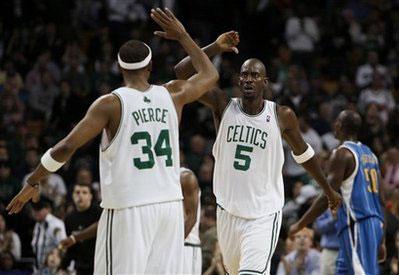 Boston&nbsp;Celtics'&nbsp;Kevin&nbsp;Garnett&nbsp;(5)&nbsp;and&nbsp;Paul&nbsp;Pierce&nbsp;walk&nbsp;toward&nbsp;each&nbsp;other&nbsp;for&nbsp;congratulations&nbsp;as&nbsp;New&nbsp;Orleans&nbsp;Hornets'&nbsp;Emeka&nbsp;Okafor,&nbsp;right,&nbsp;walks&nbsp;away&nbsp;during&nbsp;the&nbsp;second&nbsp;half&nbsp;of&nbsp;Boston's&nbsp;97-87&nbsp;win&nbsp;in&nbsp;a&nbsp;NBA&nbsp;basketball&nbsp;game&nbsp;in&nbsp;Boston&nbsp;Sunday,&nbsp;Nov.&nbsp;1,2009.(AP&nbsp;Photo/Winslow&nbsp;Townson)