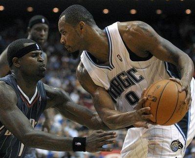 Orlando&nbsp;Magic&nbsp;forward&nbsp;Rashard&nbsp;Lewis,&nbsp;right,&nbsp;looks&nbsp;for&nbsp;an&nbsp;opening&nbsp;as&nbsp;Charlotte&nbsp;Bobcats&nbsp;forward&nbsp;Stephen&nbsp;Jackson&nbsp;defends&nbsp;during&nbsp;the&nbsp;second&nbsp;half&nbsp;of&nbsp;an&nbsp;NBA&nbsp;basketball&nbsp;game&nbsp;in&nbsp;Orlando,&nbsp;Fla.,&nbsp;Monday,&nbsp;Nov.&nbsp;16,&nbsp;2009.&nbsp;The&nbsp;Magic&nbsp;won&nbsp;97-91.(AP&nbsp;Photo/Phelan&nbsp;M.&nbsp;Ebenhack)