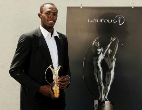 In this image released by the Laureus Awards on Wednesday March 10, 2010, Jamaican sprint star Usain Bolt poses with the Laureus World Sportsman of the Year Award in Kingston, Jamaica. Bolt who won the Laureus World Sportsman of the Year for the second year running, was unable to attend the awards ceremony in Abu Dhabi, UAE, on Wednesday.