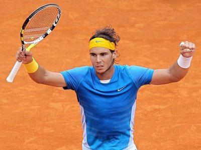 Rafael Nadal celebrates after winning the match against his compatriot David Ferrer during the Monte-Carlo ATP Masters Series Tournament in Monaco. Nadal won 6-2 6-3. (AFP/Valery Hache)