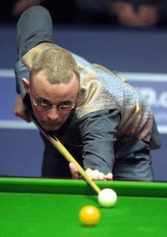 Martin Gould of Great Britain plays against Marco Fu of Hong Kong during the World Championship Snooker at the Crucible Theatre in Sheffield, England. Fu was the first significant name to fall in the world championship after the Hong Kong star squandered an 8-6 lead to lose his first-round tie with Gould 10-9.(AFP/Andrew Yates)