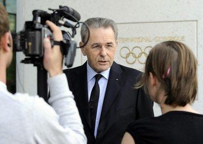 Jacques Rogge, President of the International Olympic Committee (IOC), speaks to journalists in front of the IOC headquarters in Lausanne, Switzerland, Wednesday, April 21, 2010. Rogge commented on the death of former IOC president Juan Antonio Samaranch, who died on 21 April at the age of 89. The Quiron Hospital in Barcelona said Samaranch died after being admitted with heart problems. Samaranch headed the IOC from 1980 to 2001. He retired as the second-longest serving president in the history of the IOC.(AP Photo/KEYSTONE/Christian Brun)