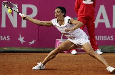 Italy's Francesca Schiavone returns the ball to Czech Republic's Lucie Safarova during a tennis a Fed Cup semifinal match, in Rome, Saturday, April 24, 2010. (AP Photo/Andrew Medichini)