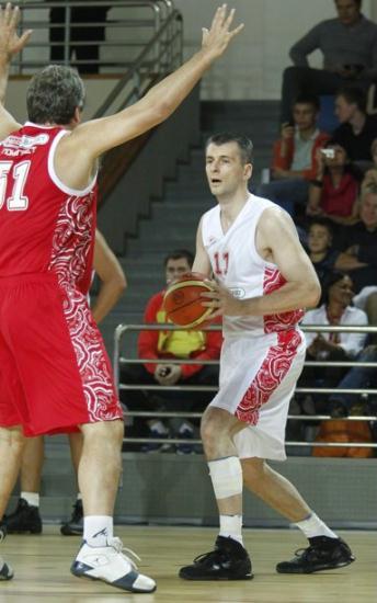 Billionaire Russian businessman Mikhail Prokhorov plays in a charity basketball game in Moscow September 6, 2011. Prokhorov is the owner of the NBA basketball team, the New Jersey Nets. REUTERS/Tatyana Makeyeva