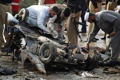 Members&nbsp;of&nbsp;a&nbsp;bomb&nbsp;disposal&nbsp;team&nbsp;stand&nbsp;over&nbsp;an&nbsp;auto-rickshaw&nbsp;which&nbsp;was&nbsp;destroyed&nbsp;in&nbsp;a&nbsp;suicide&nbsp;bomb&nbsp;attack&nbsp;in&nbsp;Peshawar&nbsp;November&nbsp;9,&nbsp;2009.&nbsp;A&nbsp;suicide&nbsp;bomber&nbsp;in&nbsp;the&nbsp;auto-rickshaw&nbsp;blew&nbsp;himself&nbsp;up&nbsp;in&nbsp;Pakistan&nbsp;on&nbsp;Monday&nbsp;killing&nbsp;three&nbsp;people&nbsp;when&nbsp;police&nbsp;stopped&nbsp;him&nbsp;at&nbsp;a&nbsp;checkpoint&nbsp;on&nbsp;the&nbsp;outskirts&nbsp;of&nbsp;the&nbsp;city&nbsp;of&nbsp;Peshawar,&nbsp;police&nbsp;said.&nbsp;REUTERS/K&nbsp;Parvez