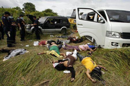 Dead&nbsp;bodies&nbsp;lie&nbsp;on&nbsp;the&nbsp;ground&nbsp;near&nbsp;their&nbsp;vehicles&nbsp;at&nbsp;the&nbsp;crime&nbsp;scene&nbsp;of&nbsp;a&nbsp;massacre&nbsp;of&nbsp;a&nbsp;political&nbsp;clan&nbsp;that&nbsp;included&nbsp;several&nbsp;journalists&nbsp;in&nbsp;the&nbsp;outskirts&nbsp;of&nbsp;Ampatuan,&nbsp;Maguindanao&nbsp;in&nbsp;southern&nbsp;Philippines&nbsp;Nov.&nbsp;24,&nbsp;2009.(Xinhua/Reuters&nbsp;Photo)