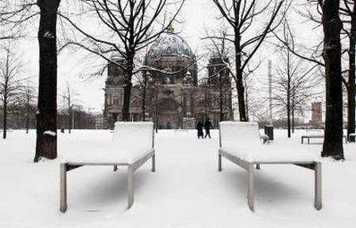 Benches are covered with snow in front of the Berlin Cathedral (Berliner Dom) in Berlin December 31, 2009. REUTERS/Thomas Peter 