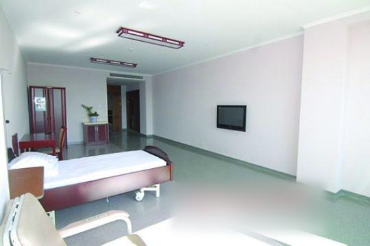 名"吉林大学白求恩第一医院",以下简称"吉大一院")新建的干部病房大楼