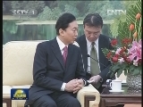 贾庆林会见日本前首相