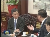 习近平会见梁振英