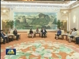 习近平会见世界卫生组织总干事