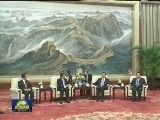 张德江会见老挝总理