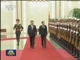 习近平举行仪式欢迎法国总统访华