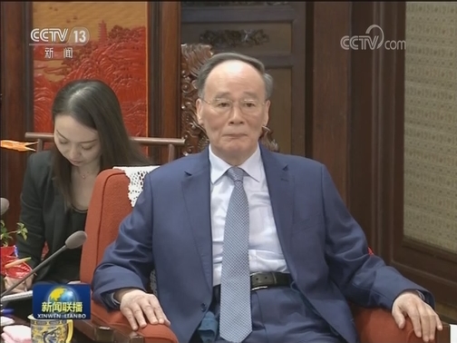 王岐山会见哈萨克斯坦外长